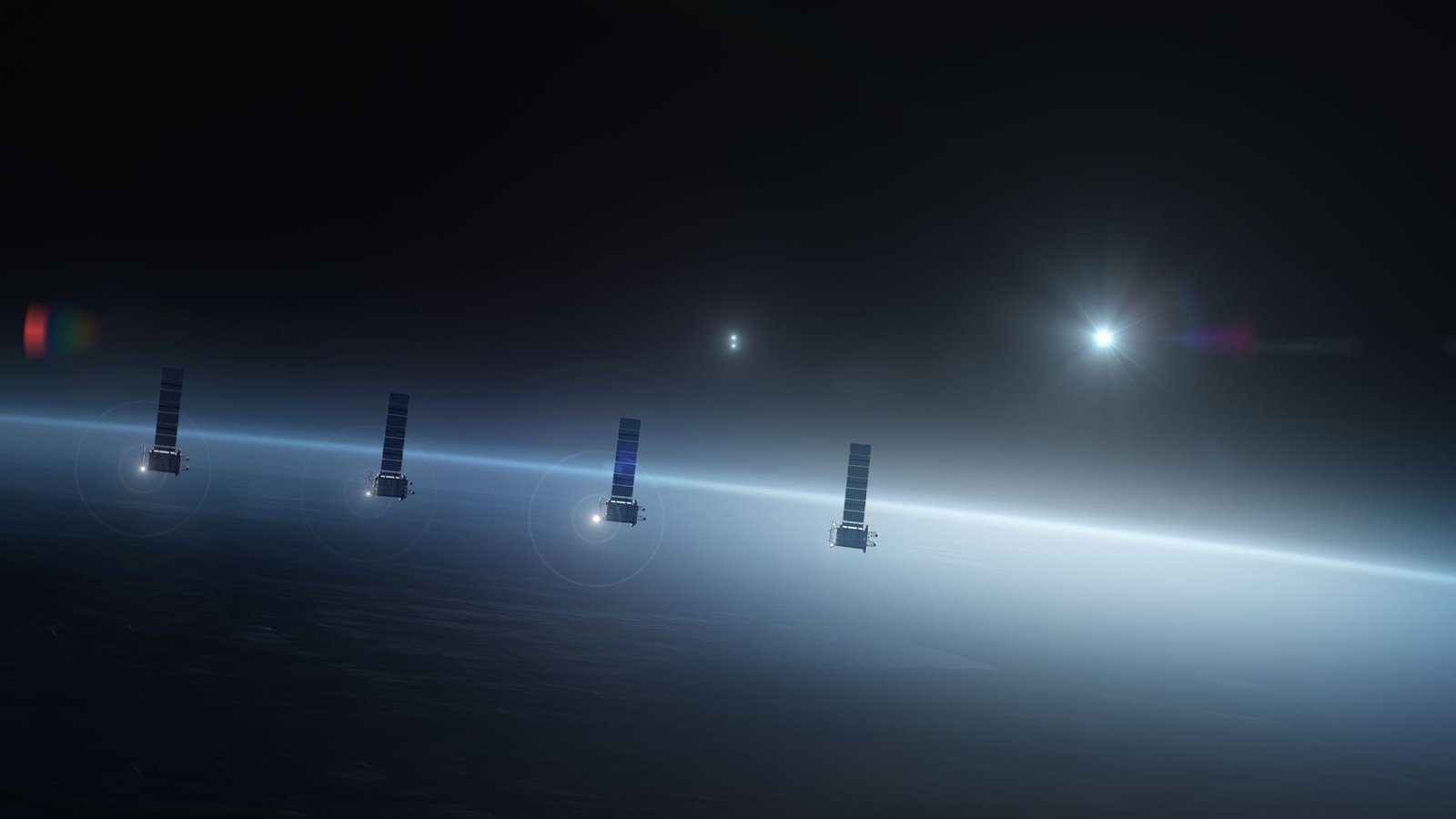 Four satellites in a row above the limb of the Earth